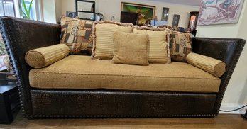 (LR) PAIR OF IDENTICAL EMBOSSED LEATHER SOFAS WITH CUSHIONS