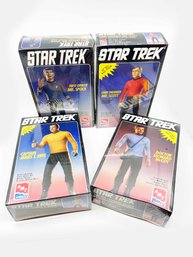 (D-16) VINTAGE LOT OF 4 UNOPENED STAR TREK VINYL MODEL KITS-CAPT. KIRK, MR. SPOCK, MR. SCOTT & DR. MCCOY-AMT