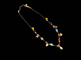 (A-30) BEAUTIFUL GOLD CHARM AND BEADED 15' LONG NECKLACE-CHAIN MARKED 9KT & CHARMS MARKED 14KT