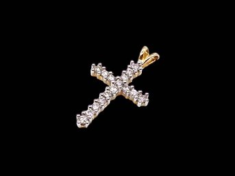 (A-33) STUNNING 14 KARAT GOLD AND 16 DIAMOND CROSS PENDANT-APPROX.(.03 EACH DIAMOND)
