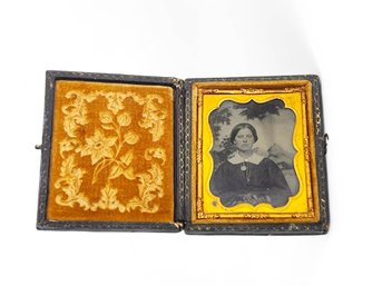 (A-37) ANTIQUE DAGUERREOTYPE LEATHER PHOTO FRAME -WOMAN CIVIL WAR ERA-HAND COLORED