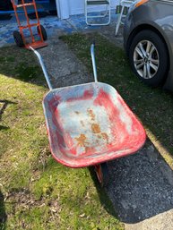 (G) WELL WORN BUT WORKIN WHEEL BARROW