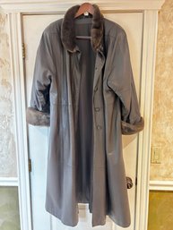 (LR) VINTAGE FULL LENGTH LEATHER COAT W/ FAUX FUR COLLAR & CUFFS - APPROX. SIZE MED./LARGE - N GOOD VINTAGE CO
