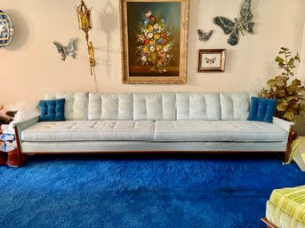 (LR) EXTREMELY LONG PALE BLUE UPHOLSTERED MID CENTURY MOD FIVE SEAT SOFA - 125' BY 35' SEAT 16'