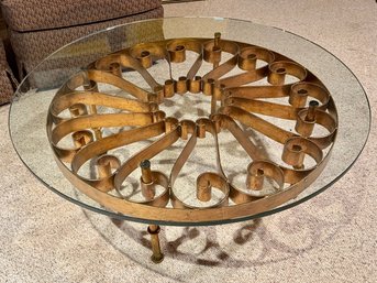 (BASE) VINTAGE MCM GILT IRON COFFEE TABLE WITH WHEEL DESIGN & GLASS TOP - 40' BY 15'