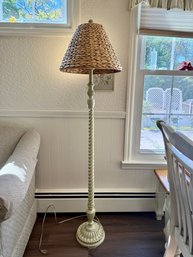 (LR) VINTAGE WHITE WOOD FLOOR LAMP WITH WICKER SHADE- 62' H