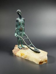(A-58) VINTAGE BRONZE SCULPTURE TITLED PLOWMAN ON ONYX BASE-POSSIBLY BOUCHARD