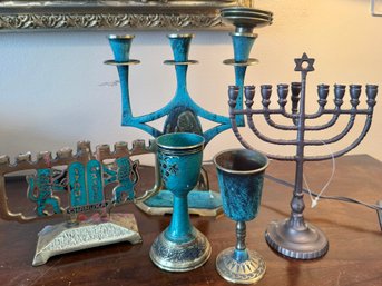 (P-13) COLLECTION OF FIVE ISRAELI ITEMS, TWO MENORAHS, TWO KIDDISH CUPS & CANDLESTICK - 12'