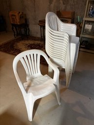 (BASE) SET OF 14 WHITE PLASTIC STACKABLE ARMCHAIRS