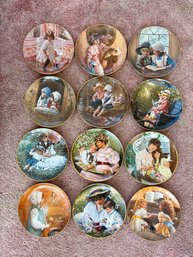 (B-26) COLLECTION OF TWELVE VINTAGE PORCELAIN COLLECTOR PLATES - RECO, SANDRA KUCK ART - APPROX: 9'
