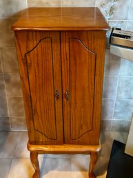 (UPBR) VINTAGE OAK STANDING JEWELRY BOX, SEE DAMAGE TO ONE DRAWER- 40' BY 17' BY 13'