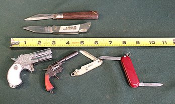 4 Pocket Knives &  2 Toy Mini Guns  (134)