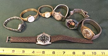 7 Wrist Watches -  3 Men's & 4 Women's   (142)
