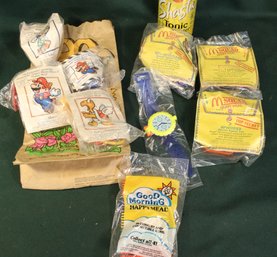 McDonald's Toys - 4 Nintendo Super Mario Bros, 4 MSquad 1992 & 1990 Connectible Combs In Bag  (175)