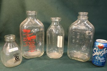 Group Of 4 Old Milk Bottles -  McColls, Redding, Ca, Bob's Dairy, Jersey Milk & Straus Creamery.  (185)