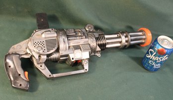 Plastic Tootsie Toy Gatling Gun, Battery Operated, Animated, Sound & Motion In Hard Guitar Case  (188)