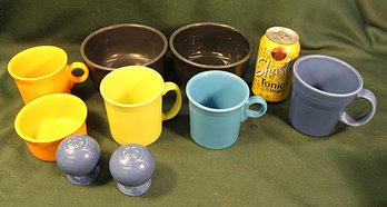 9 Pcs Fiestaware - 2 @ 6'D Bowls, 3 @ 3.5'H Mugs, 4'H Mug, 4'D Bowl, S&P Shakers  (19)