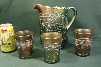 Antique Northwood 4 Pc. Green Carnival Glass Pitcher 8'H & 3 Tumblers 4'H (One Cracked)   (20)