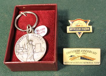 Liberty Island Key Chain, Vietnam Memorial 20th Annual Pin &  S.K.I. Winter Park Pin (85)