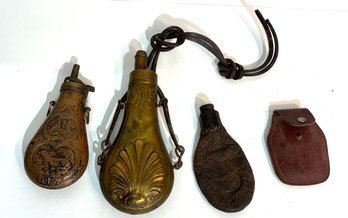 Three Powder Flasks And Later Case.