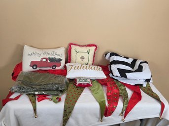 Grouping Of Christmas Pillows, Tree Skirt, & More