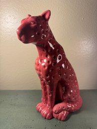 Vibrant Pink Ceramic Leopard Or Cheetah Figurine With A Glossy, Dimpled Spotted Pattern