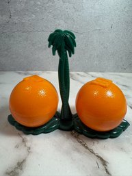 Vintage Beacon Salt And Pepper Shakers Oranges With Palm Tree Caddy Mid Century Plastic Set
