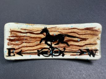 Decorative Ceramic Pin Or Brooch Featuring A Hand-painted Horse And Weathervane Silhouette