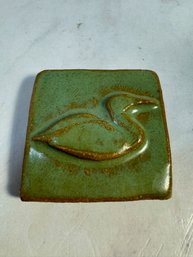 Handcrafted Ceramic Swan Art Tile 2x2 From The Whistling Frog Tile Company Featuring A Green Glaze Finish