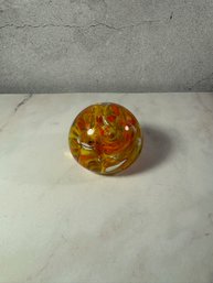 Vintage Art Glass Paperweight Features A Vibrant Design Of Hand-blown Orange And Yellow