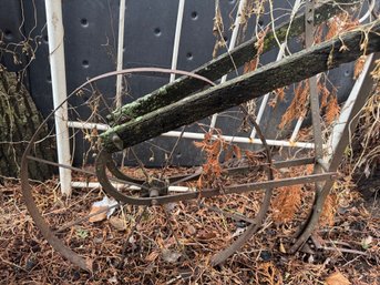 Antique Plow And Small Metal Headboard For Garden