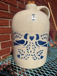 Stoneware Jug Featuring A Blue Stenciled Folk Art Bird