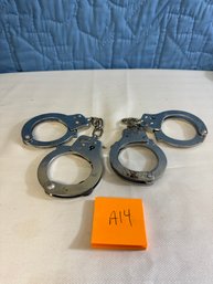 Two Sets Of Handcuffs