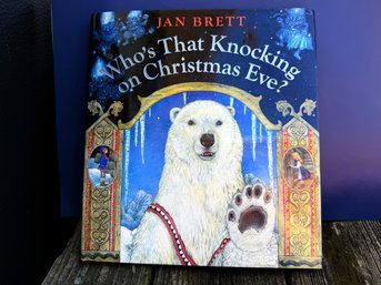 Who's That Knocking On Christmas Eve? Written And Illustrated By Jan Brett