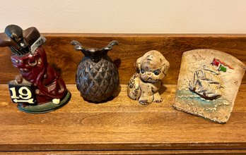 Three Small Door Stops And A Bookend