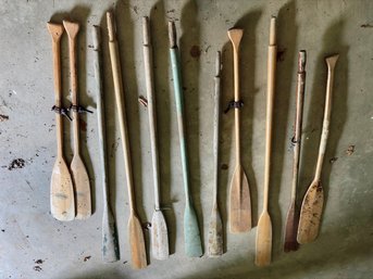 Group Of Wooden Paddles Including A Pair Of Feather Light