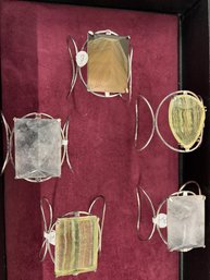 POLISHED STONE CUFFS