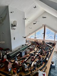 Large Lot Of Trains Includes Set Up On Third Floor And Shelves Of Parts Etc..