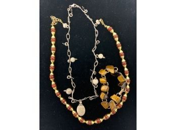 -two Necklaces And One Bracelet