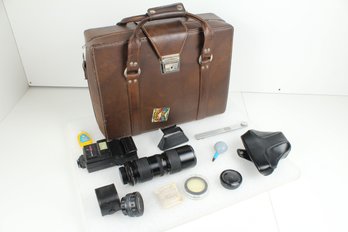 Brown Leather Camera Case With Everything You Need For Photography Except The Camera