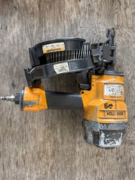 Durable Bostitch N64C Coil Framing Nailer With High-capacity Nail Drum For Heavy-duty Construction Tasks.