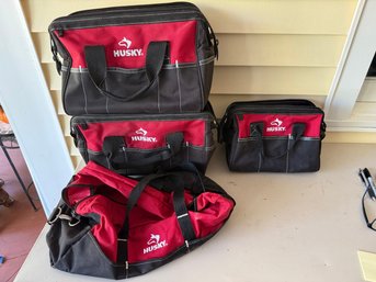 4 Husky Carry Bags