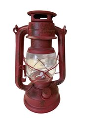 Battery-Operated Red Lantern With Model H6LH On Base
