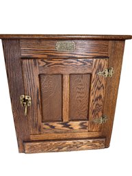 White Clad Wooden Ice Box-Style Cabinet With Brass Hardware