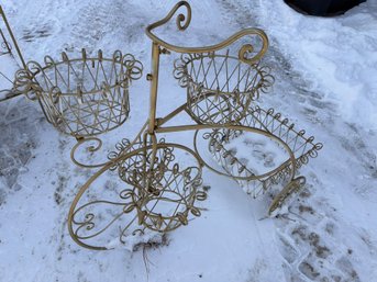 Wrought Iron Outdoor Planters With Scrollwork Design