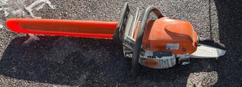 Stihl Chainsaw With Orange Blade Guard