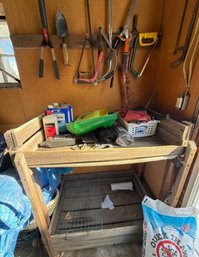 Hand Tools And Workshop Supplies With Wooden Workbench
