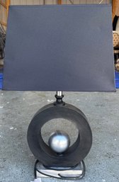 Modern Circular Table Lamp With Black Shade And Metallic Accent
