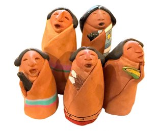 Five Handcrafted Clay Figurines Of Singing Individuals