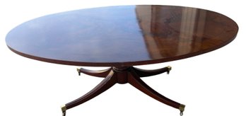 Oval Mahogany Pedestal Coffee Table With Brass Feet